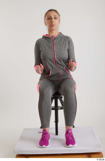  Mia Brown  1 dressed grey hoodie grey leggings pink sneakers sitting sports whole body 0015.jpg